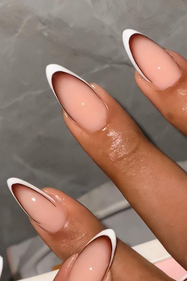 Brown and white French tip nails