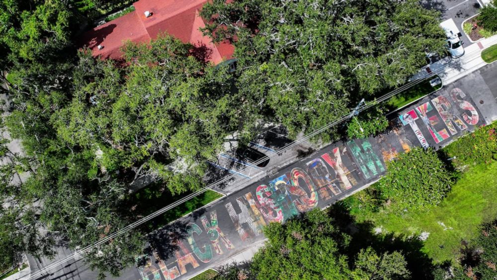 State crews came to paint over a Black History Matters mural outside the Woodson African American Museum of Florida.