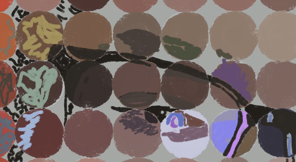 close-up detail of circles with different colors drawn inside and outside of them, combined to make my right eye and half my glasses