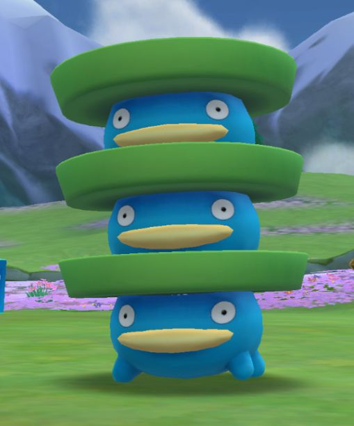 Three Lotad sitting a field stacked on top of each other in PokePark for the Wii.