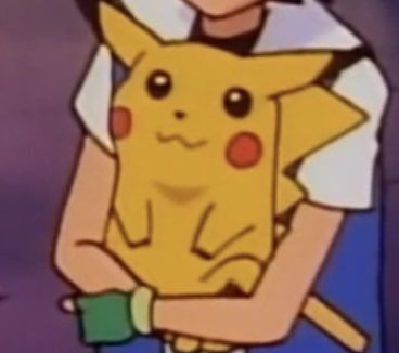 Screenshot of pikachu being held in the Pokémon anime 