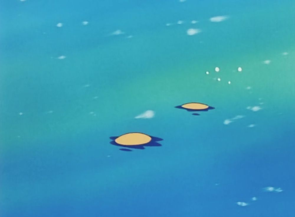 Screenshot of Psyduck going under the water in the Pokémon anime 