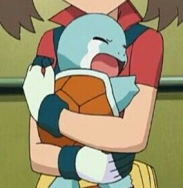 Screenshot of May holding her crying Squirtle in the Pokémon anime 
