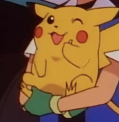 Screenshot of pikachu being held in the Pokémon anime