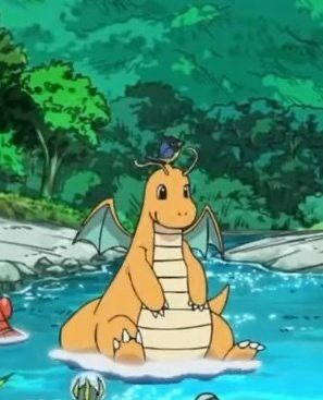 Screenshot of dragonite sitting in a puddle in the Pokémon anime