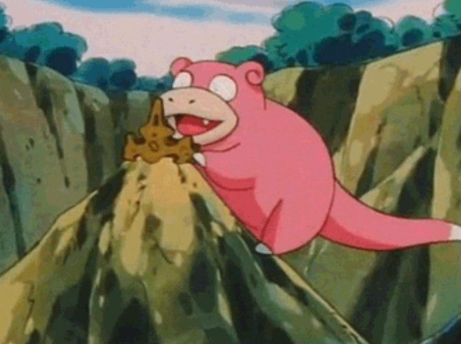 the pokemon slowpoke in the anime finding a kings rock on top of a rock 