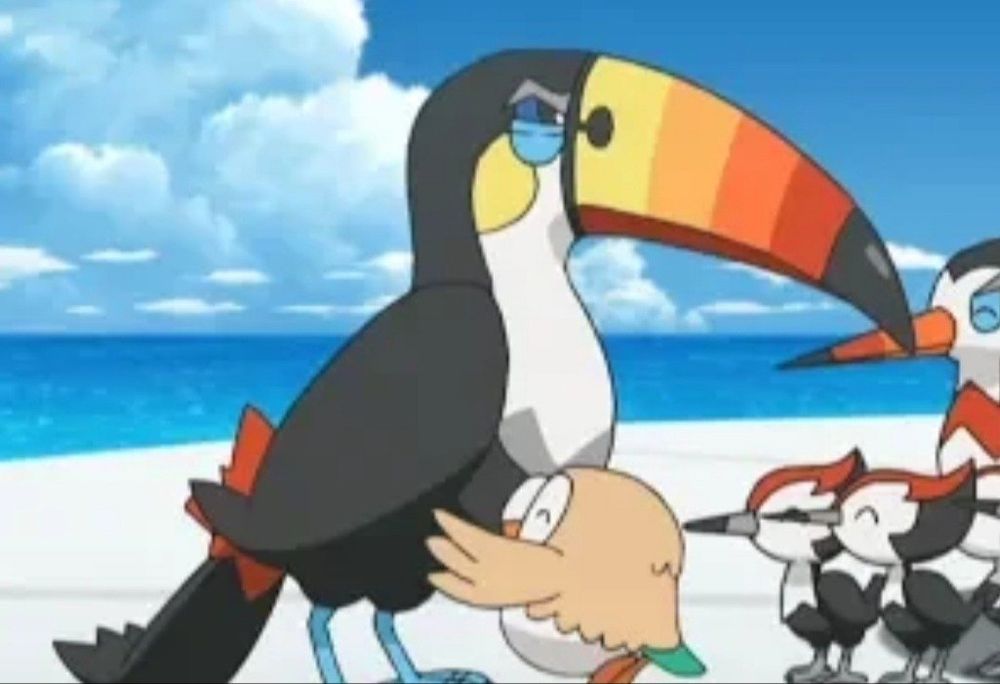 Screenshot of Rowlet hungry and angry Toucanon in the Pokémon anime