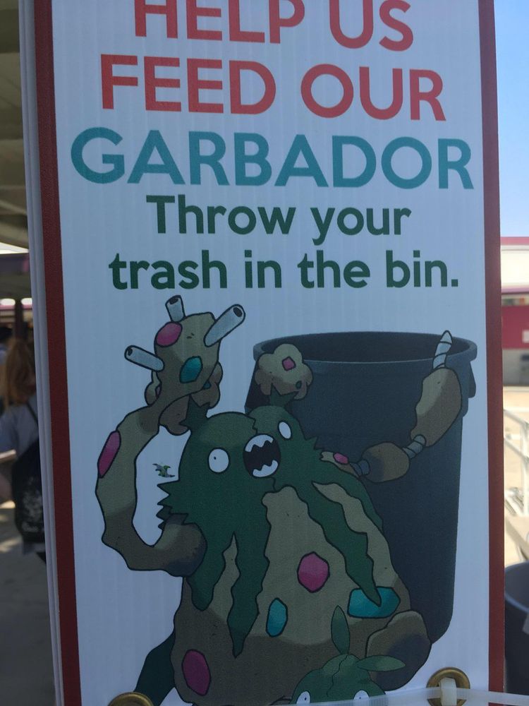 Sign with a Garbodor on it promoting throwing trash away properly reading “Help us feed our Garbodor. Throw you trash in the bin.”