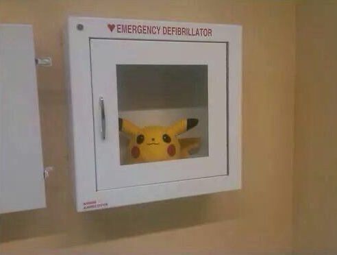 Picture of a Pikachu plush in a emergency defibrillator case 