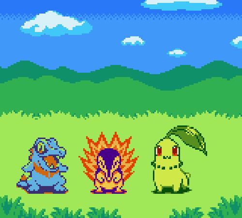 The Johto starter Pokémon standing on a pixelated grass background with a blue pixelated sky in the background 