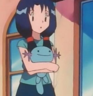 Olesia holding the Pokémon wooper in her arms in the Pokémon anime 