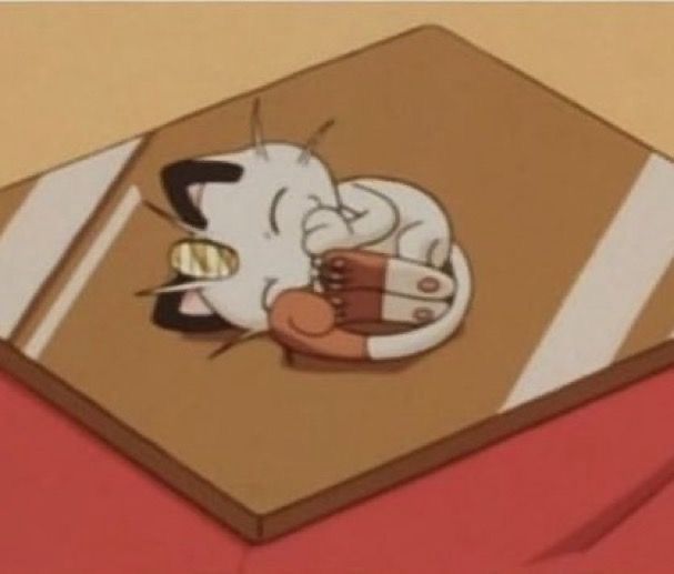 Screenshot of meowth in the Pokémon anime happy and curled up 