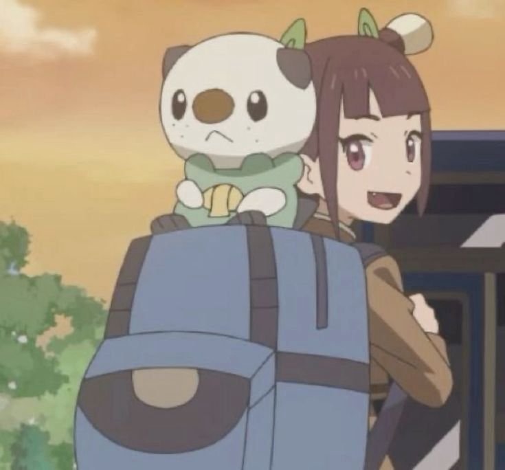 Screenshot of Oshawott in Pokémon horizons sitting on top of a backpack 