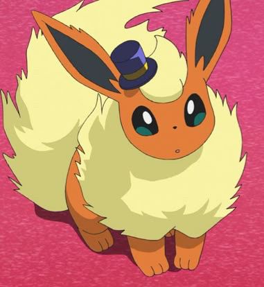 Screenshot of the Pokémon anime showing a Flareon wearing a tophat