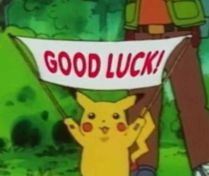 Screenshot of Pikachu in the Pokémon anime holding up a sign that says “Good Luck.”