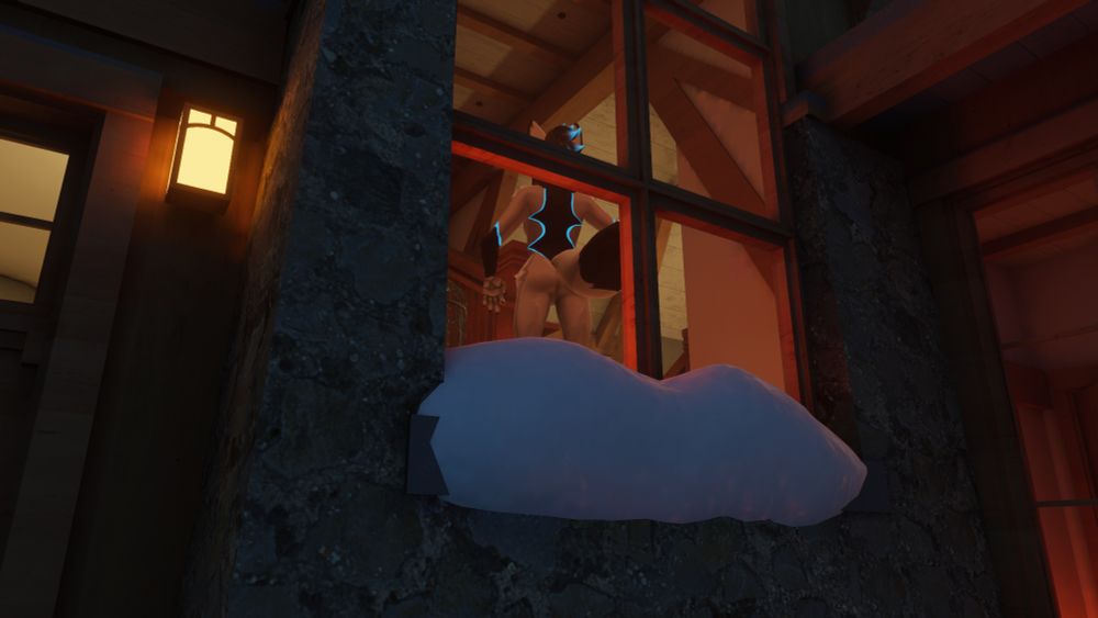 Ikodo standing naked on the staircase of a home, his butt clearly visible through the window
