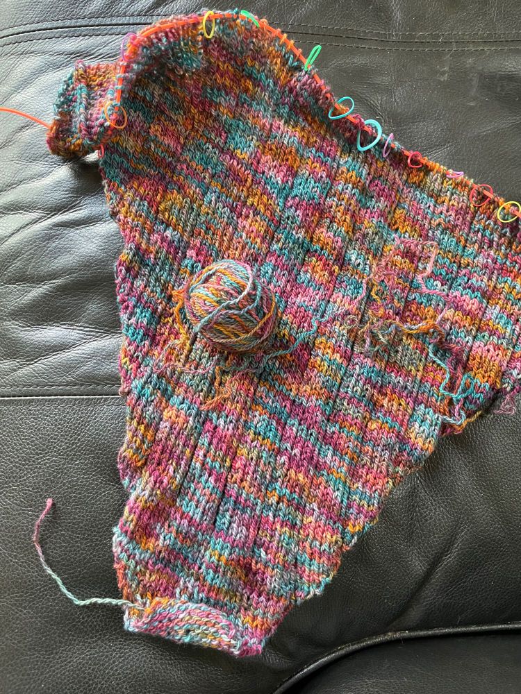 The increase section of a clapotis, and the remaining ball of yarn showing that I used almost the whole ball to do >1/4th of the pattern 
