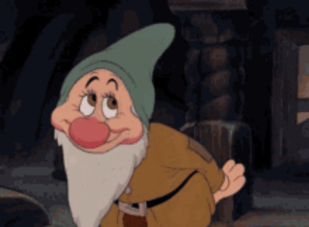 a cartoon character with a green hat and beard