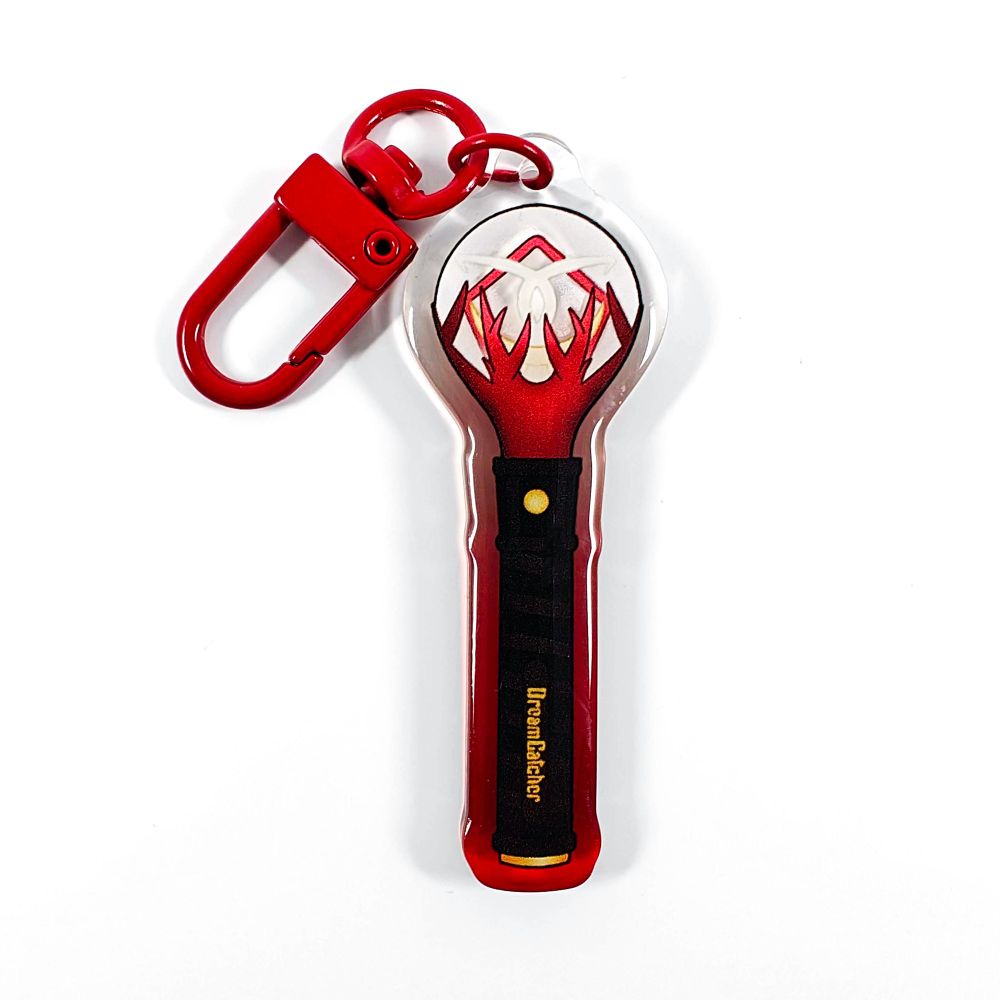 A picture of an acrylic keychain of a drawn version of Dreamcatcher's newest lightstick. The rim of the keychain has an ombre that goes from red at the bottom to clear at the top. It has a red clasp.
