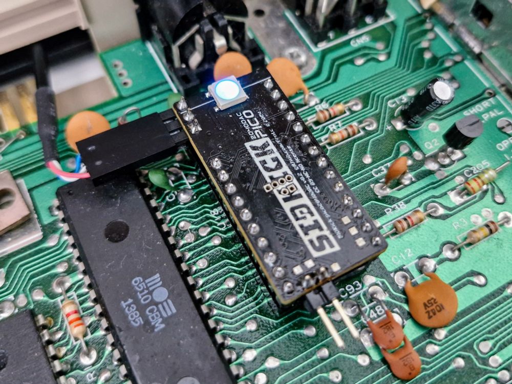 SIDKick Pico 2040DAC, an extremely capable SID chip replacement for the Commodore 64, installed in a 250425 motherboard.