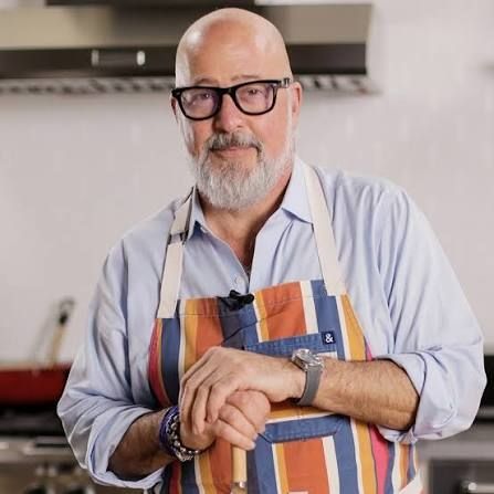 Andrew Zimmern in an apron I'd like to take off of him