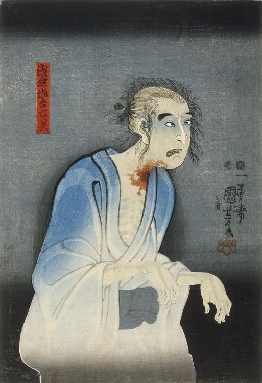 A ghostly figure in a blue robe with hands out in front. Pale grey-blue skin with blood around the neck. Grey background.