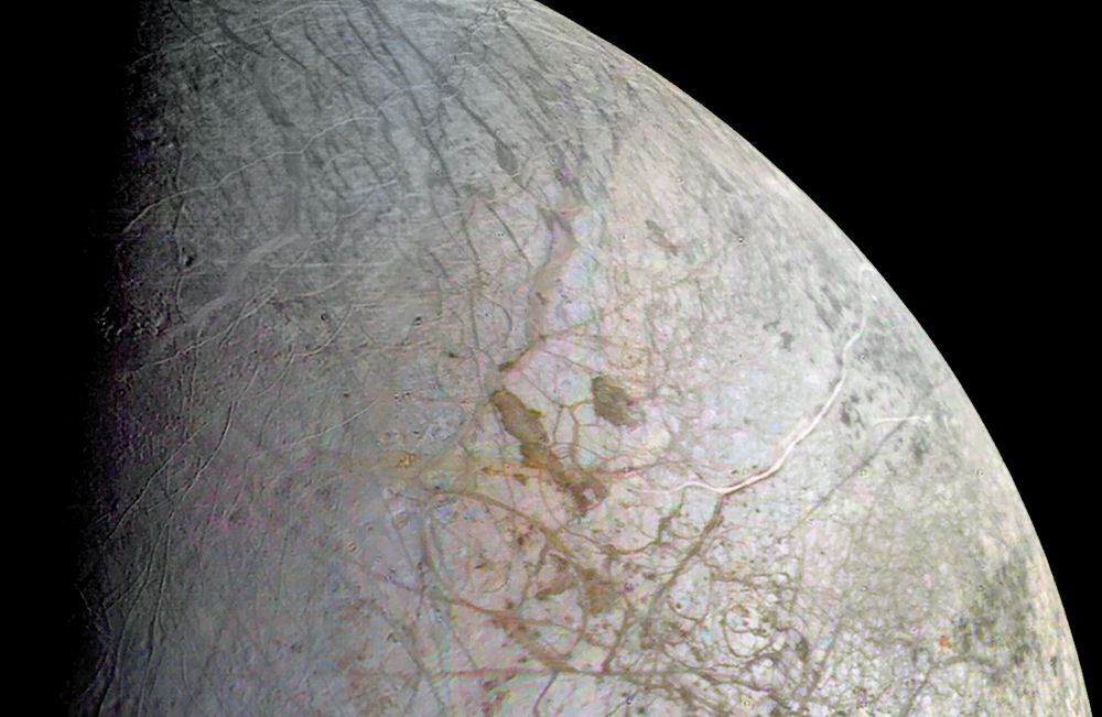 Europa from Voyager 2, showing the intricate features on its surface.