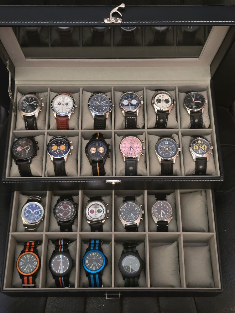 Twin stack watch box with 24 sections, 21 of which have an Omologato watch in