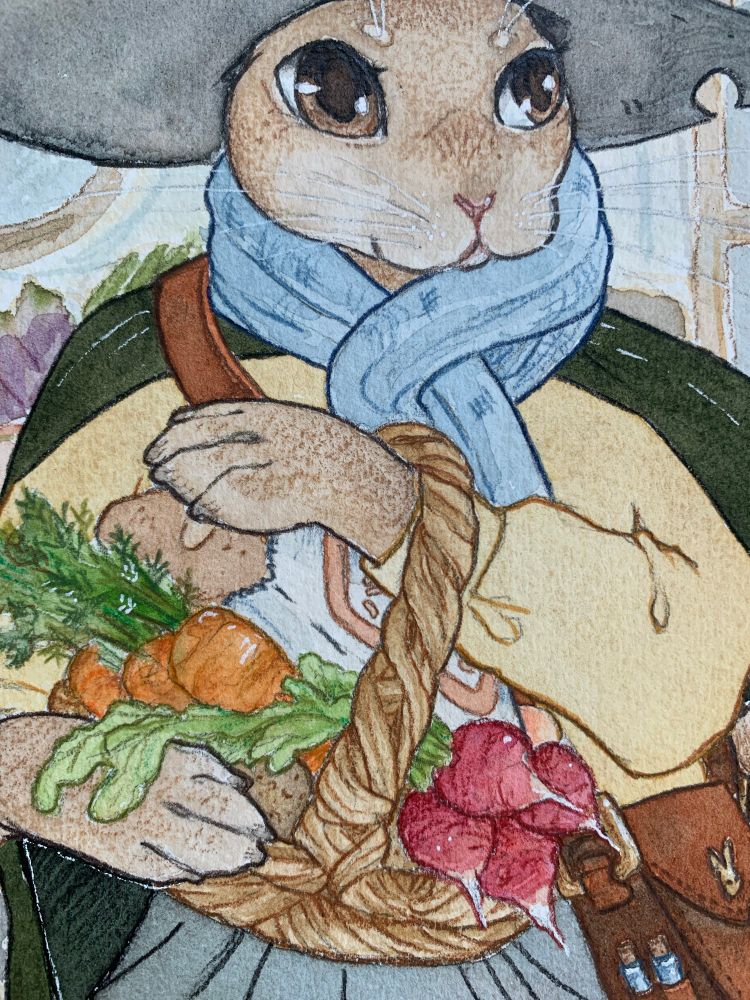A close up of the watercolor painting, highlighting the details of the shopping basket: the handle of the basket is twisted reeds, in the basket are bright orange carrots, red turnips, potatoes, and a loaf of bread in white paper. The witchy bunny’s leather bag is also visible, where we can see two small glass vials and a clasp in the shape of a bunny head.