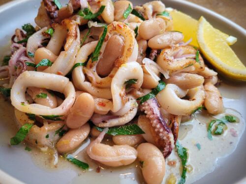 Rings of squid, aka calamari. But they look like they could be foreskins, hypothetically.