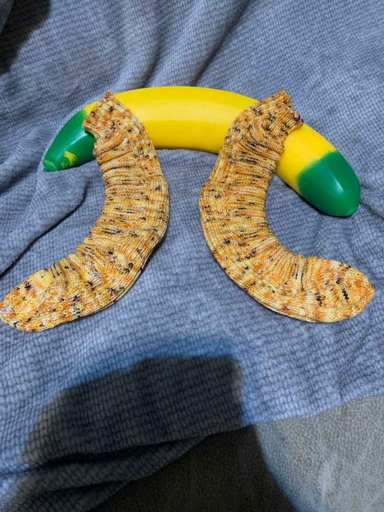 Now the banana socks are flipped around to give everyone some banana pie. Because I don't want to wait for a more reasonable time, my shadow is in the picture.