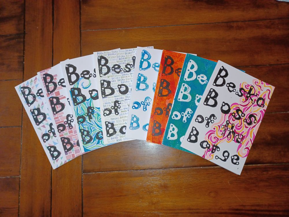 A spread of "Besko, Boss of the Barge" zines, each with a unique and wonderful cover, gosh, they're so pretty@