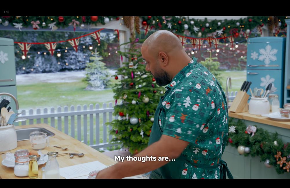 George saying "My thoughts are..." on 'The Great British Baking Show: Holidays"