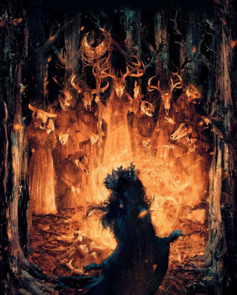 several cultists wearing animal skull masks surround a bonfire as a figure in a dress and crown wreath of leaves stumbles upon them