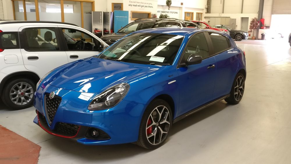 A blue Alfa romeo Guilietta in the garage of Dan Seaman in Cork, Ireland