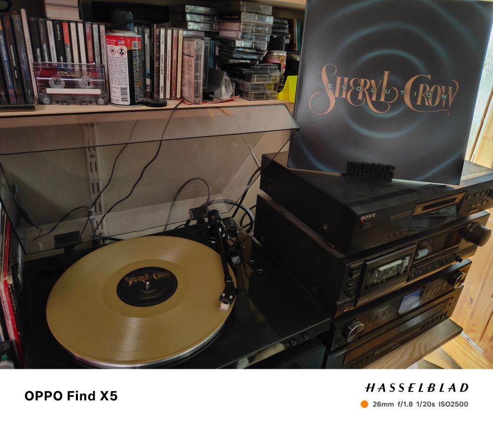 Sheryl Crow Evolution playingbfrom gold vinyl on a denon turntable.