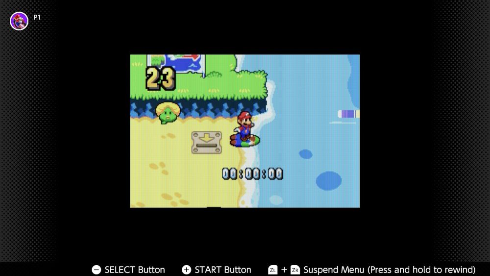 Mario standing on Luigi (as a surfboard) on the beach line just before the surfing minigame starts.