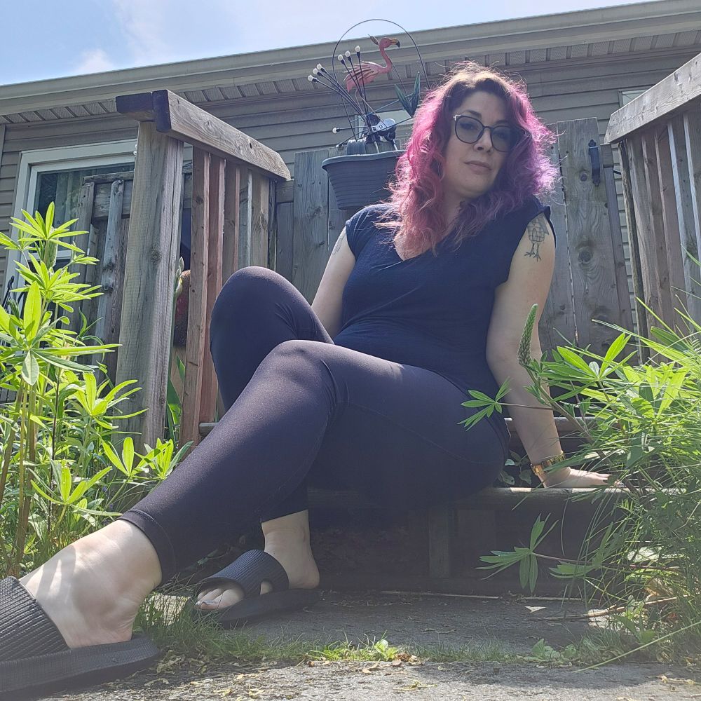 Anya lounging outside the Chicken Witch Palace.