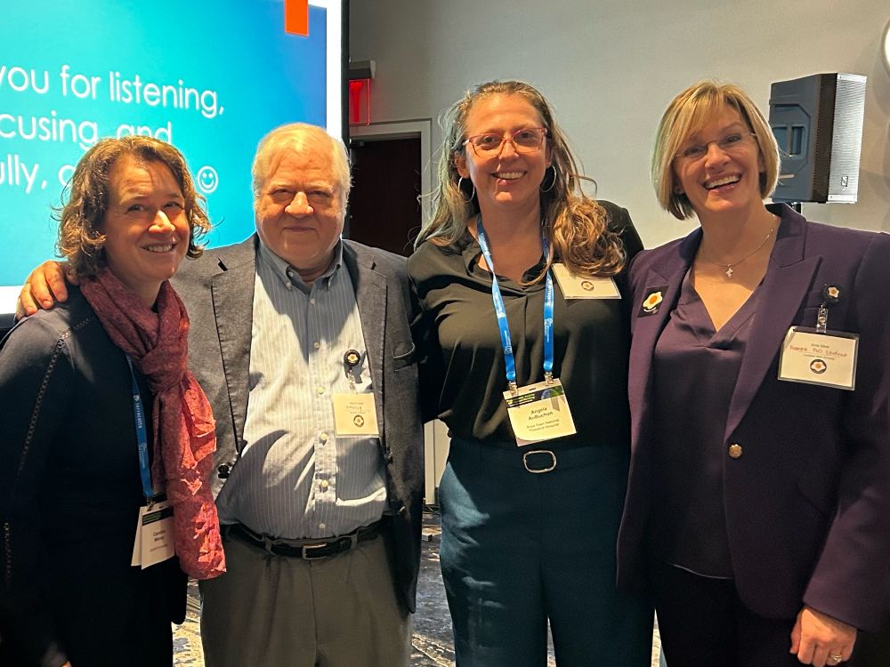 Nelson stands with CowanFest organizers Candice Morey, Angela AuBuchon, and Emily Elliott. They all look excited but a bit ragged from the long day!