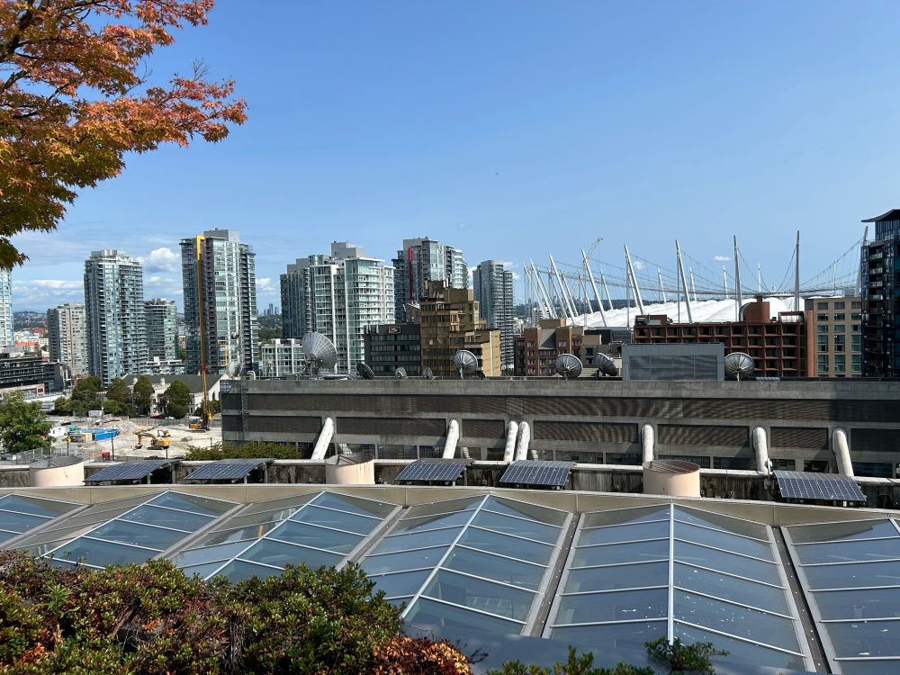 Photo of a cityscape against a blue sky