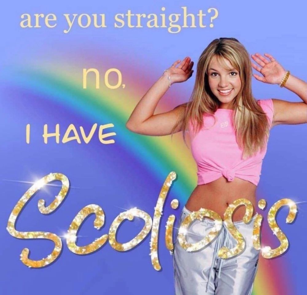 young britney spears on a rainbow background captioned “are you straight? no. i have scoliosis”