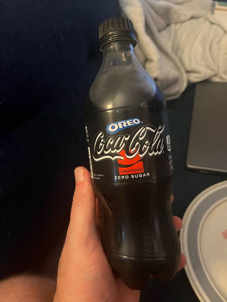 A bottle of Oreo Coca Cola.