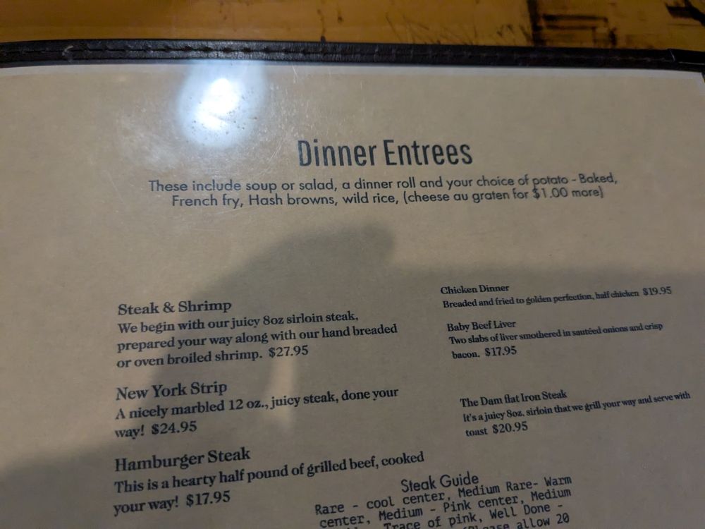 Dinner entree menu that lists choice of potato including French fry, hash brown, or wild rice 