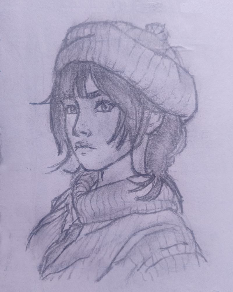 A pencil sketch, depicts a young woman with a contemplative and serious expression. She wears a knitted beanie with a small pom-pom on top, and her medium-length hair is slightly tousled, framing her face. Her eyes are sharp and focused, with furrowed eyebrows that hint at determination or deep thought. She is dressed in a thick, cozy turtleneck sweater layered with another warm garment, possibly a coat. The shading and fine details bring out the textures of the fabric and the soft depth of her facial features. The image has a slightly rough, hand-drawn feel, emphasizing its sketchbook origin.