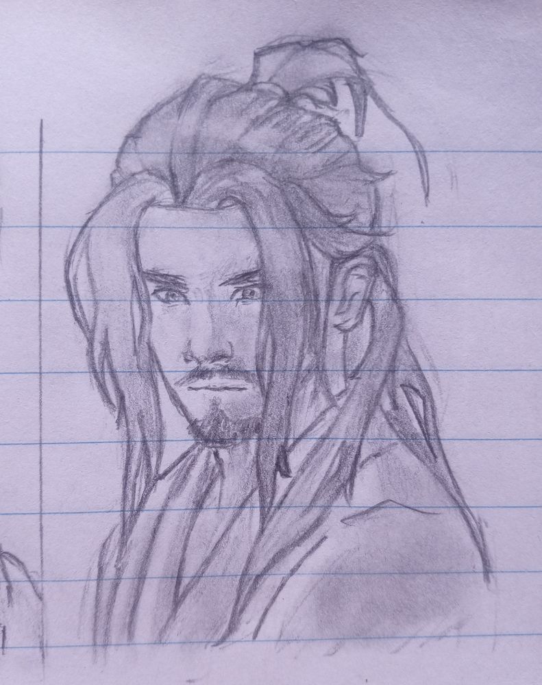 A pencil sketch of a calm, serious-looking man with long hair tied back in a loose topknot. He has a short beard and wears a robe with soft, flowing lines. The shading emphasizes his intense gaze and peaceful yet determined demeanor. The drawing is done on lined notebook paper.