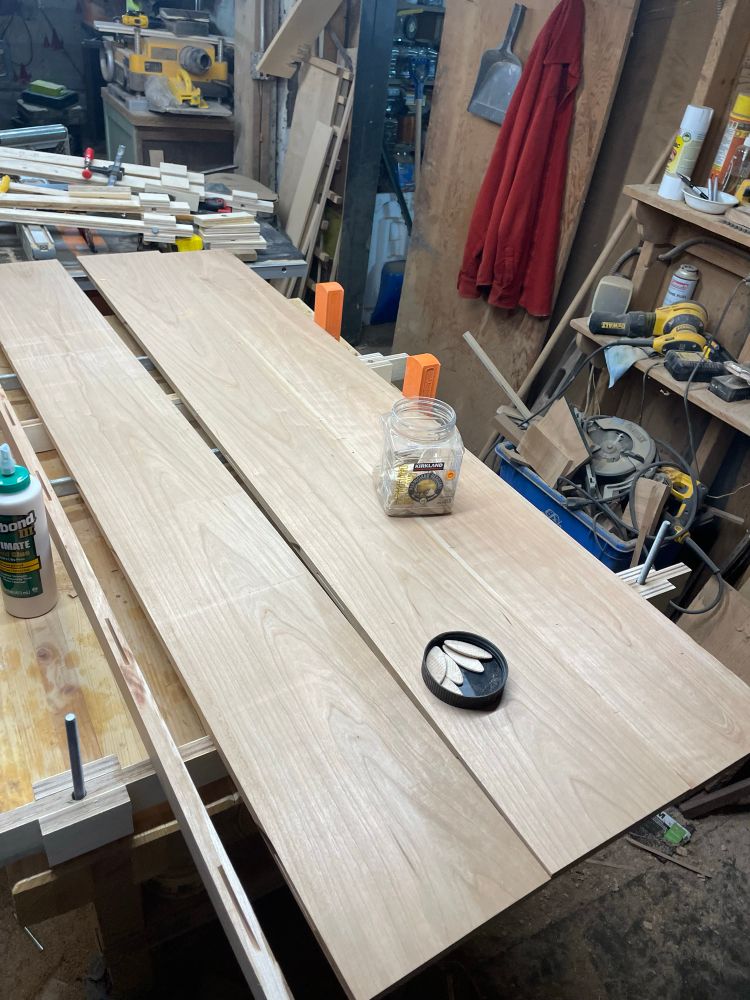 Four pieces of cherry wood about to be joined up with biscuits and glue.