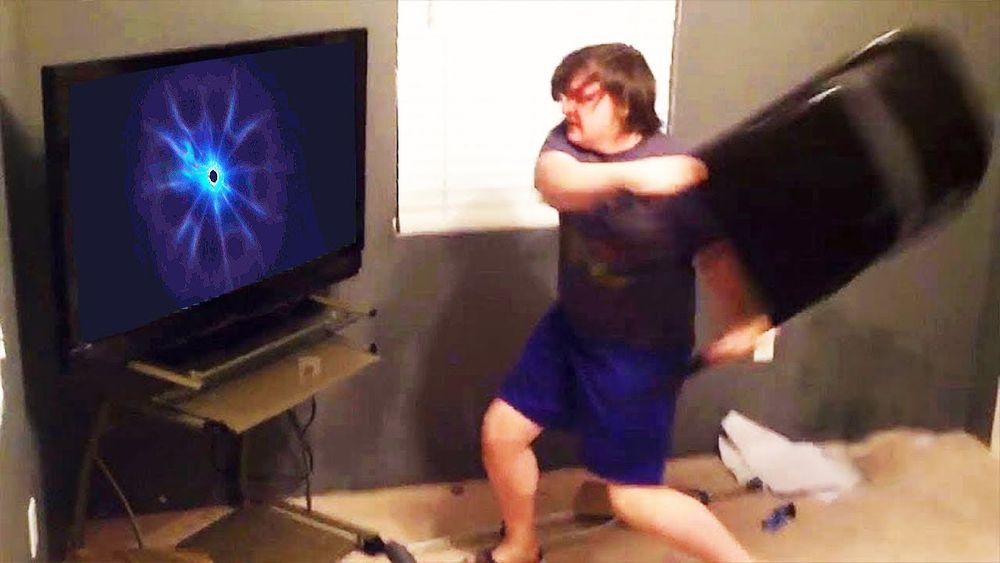 kid throwing something at a tv with the fortnite blackhole on it