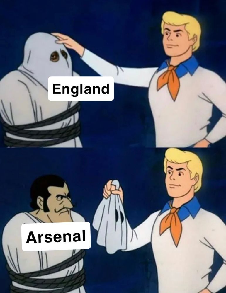 Fred from Scooby Doo taking off a villain’s mask (england) to reveal their face (arsenal)