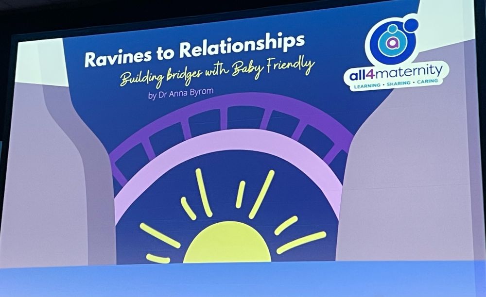 The title slide from Anna Byrom's presentation Ravines to Relationships, Building Bridges with Baby Friendly with a cartoon sun shining out from under a bridge