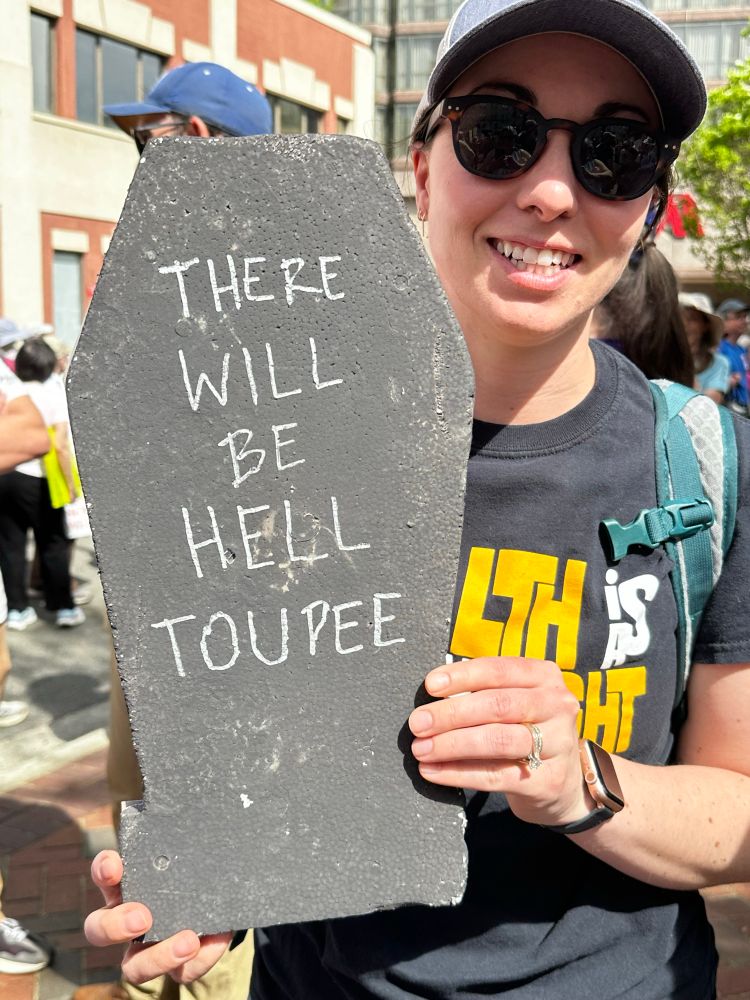 Tombstone says There will be Hell Toupee